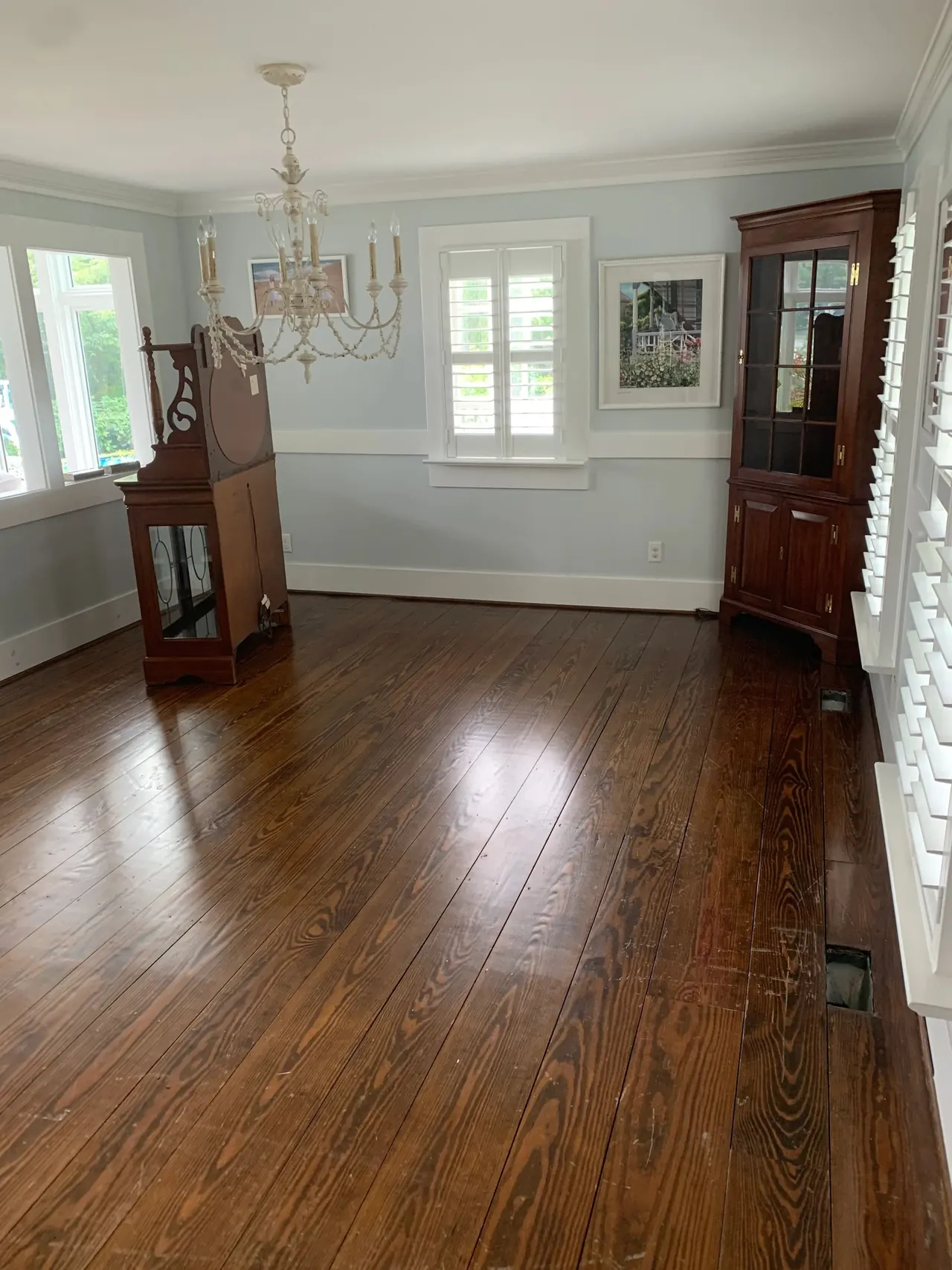 Refinished pine dining room floor in a historic home