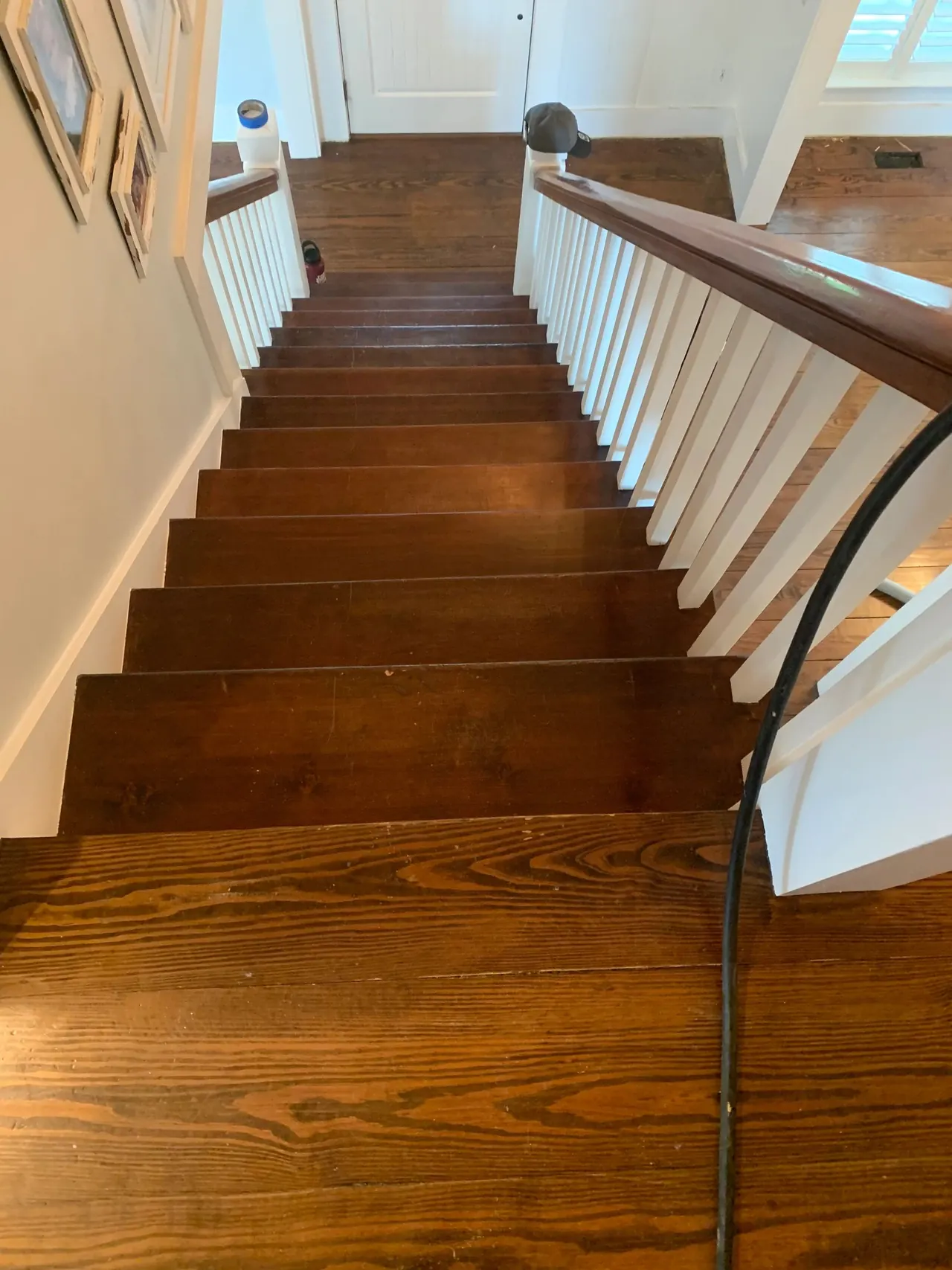 Refinished pine staircase treads with white balusters